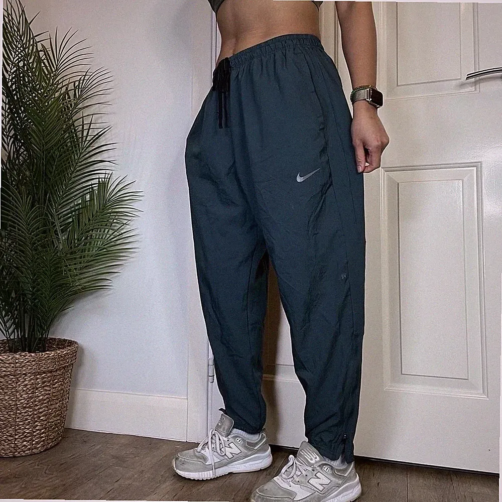 Nike Loose Fit Windbreaker Tapered Leg Track Pants Size XL Unisex Blue